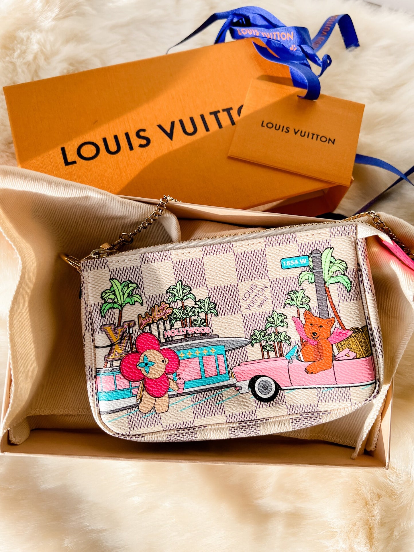 Louis Vuitton Holiday Mini Pochette (Hollywood)