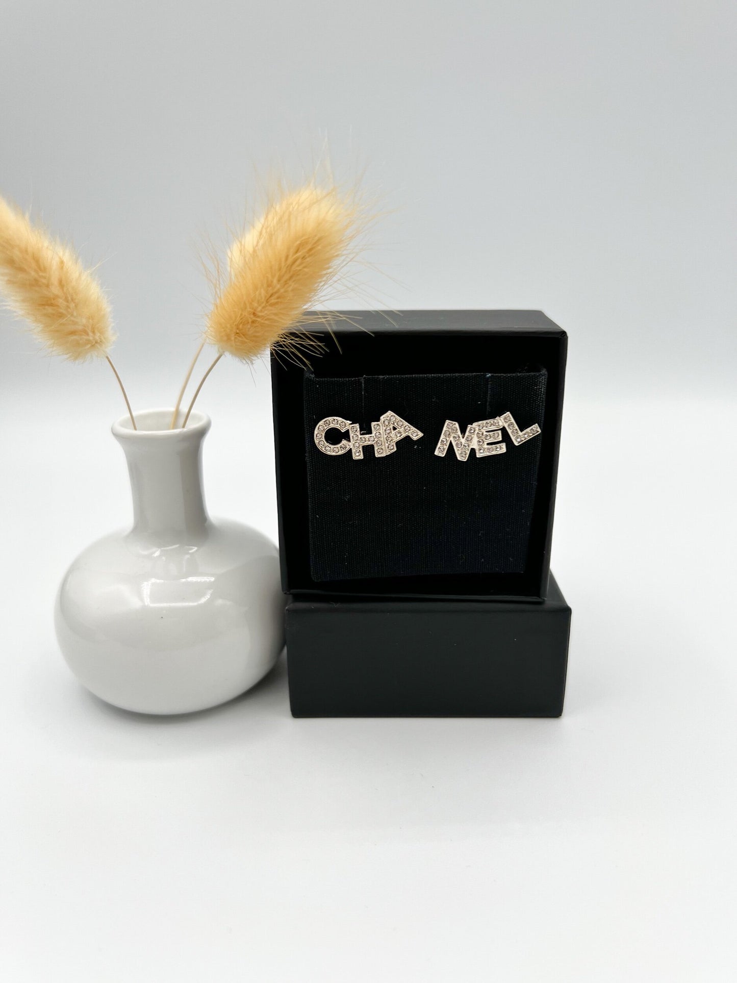 CHA NEL Stud Earrings