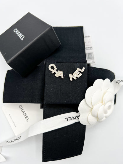 CHA NEL Stud Earrings