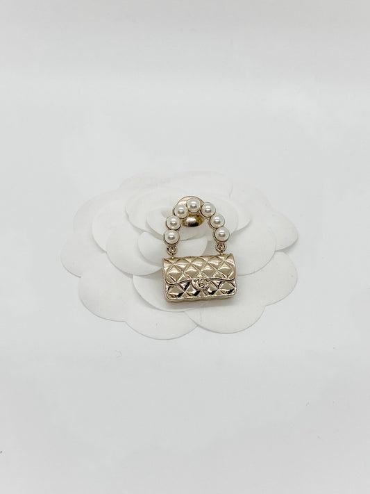 Chanel Handbag with Pearls Brooch